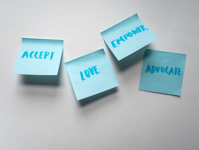 Post its with Accept, Love, Empower, Advocate