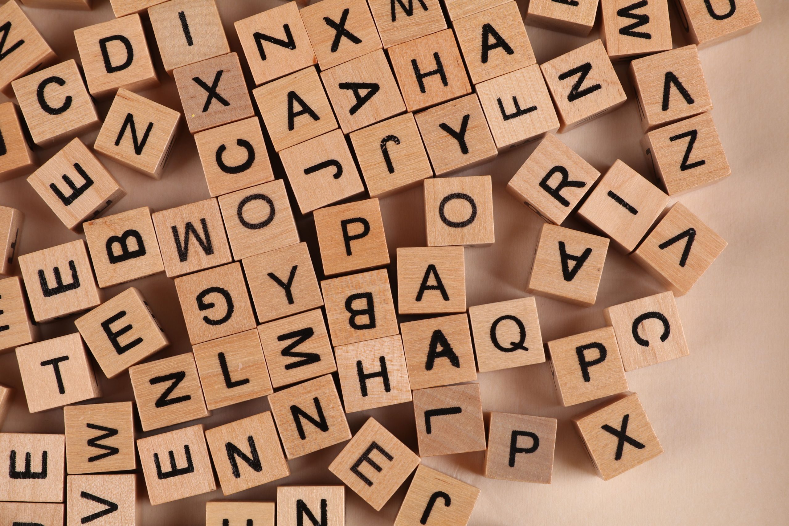 single alphabets scattered around